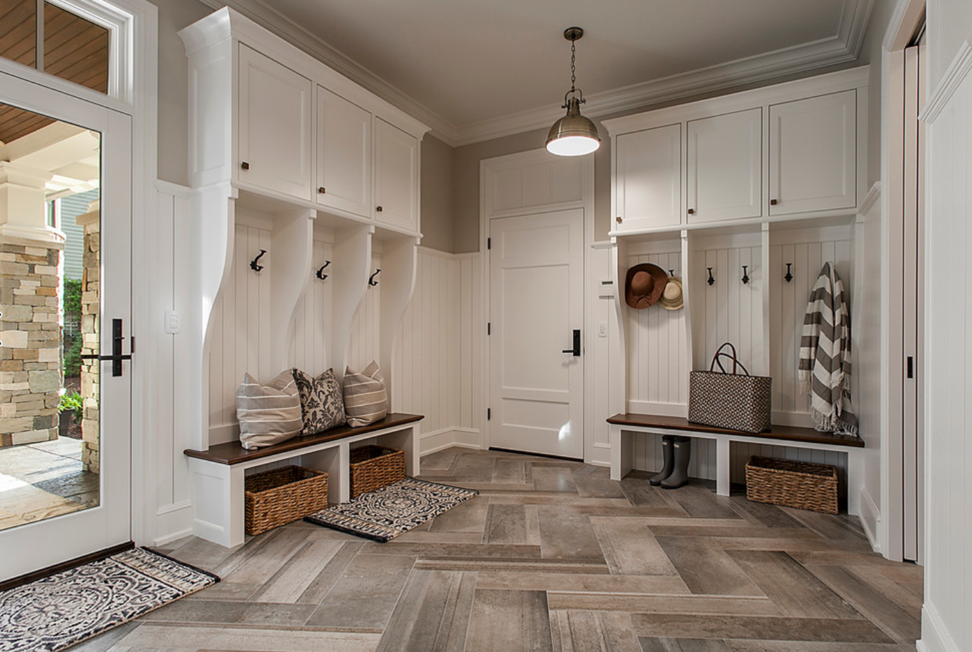 Cozy entryway with built-in bench seating and storage cubbies.